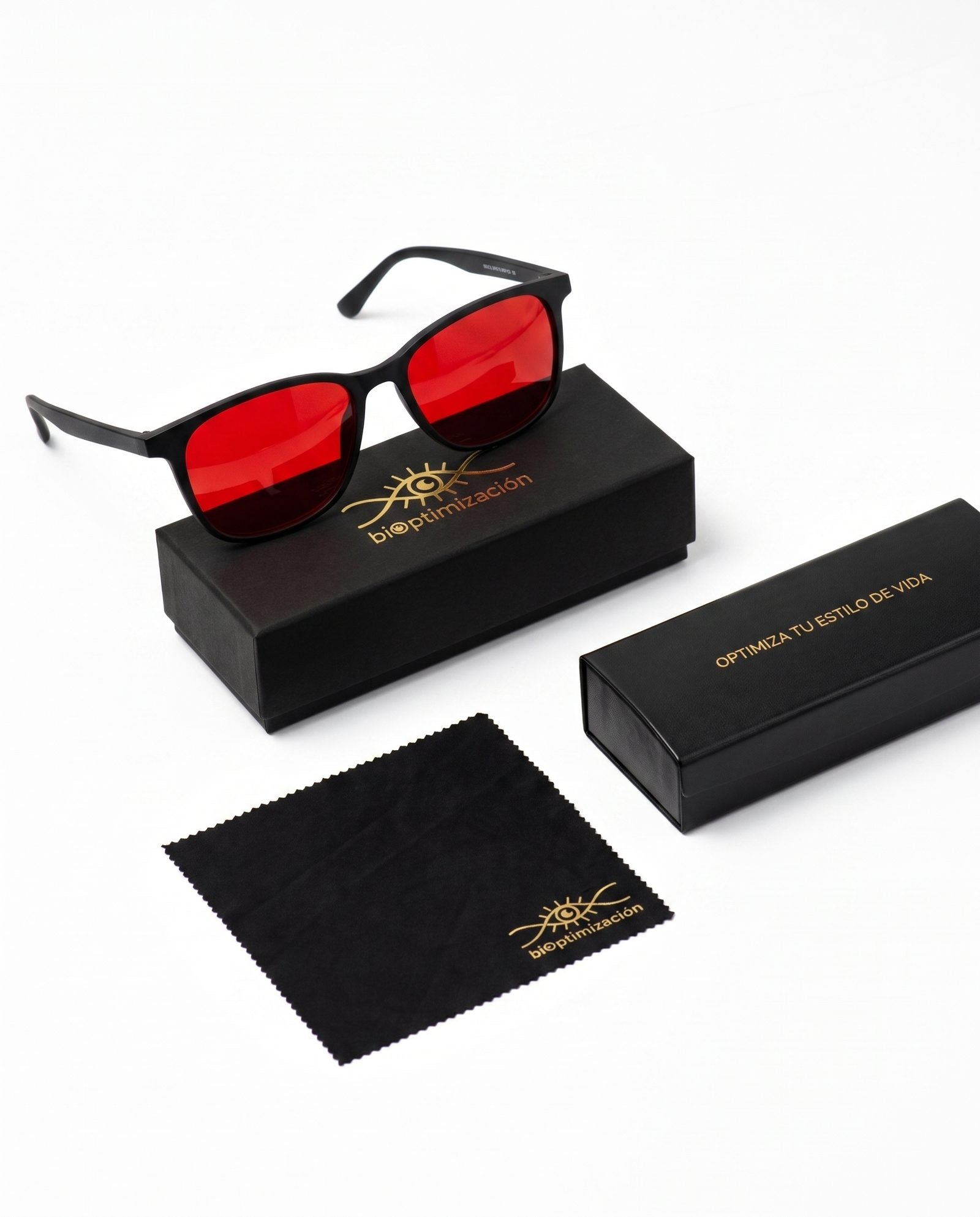 Lentes Alpha + Sueño sobre su packaging premium negro y dorado de biOptimización